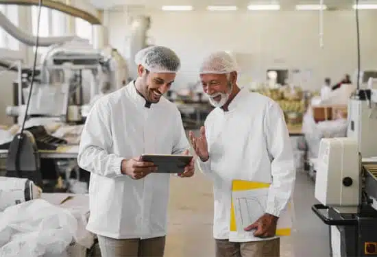 Two-Men-Talking-in-Food-Manufacturing-Plant