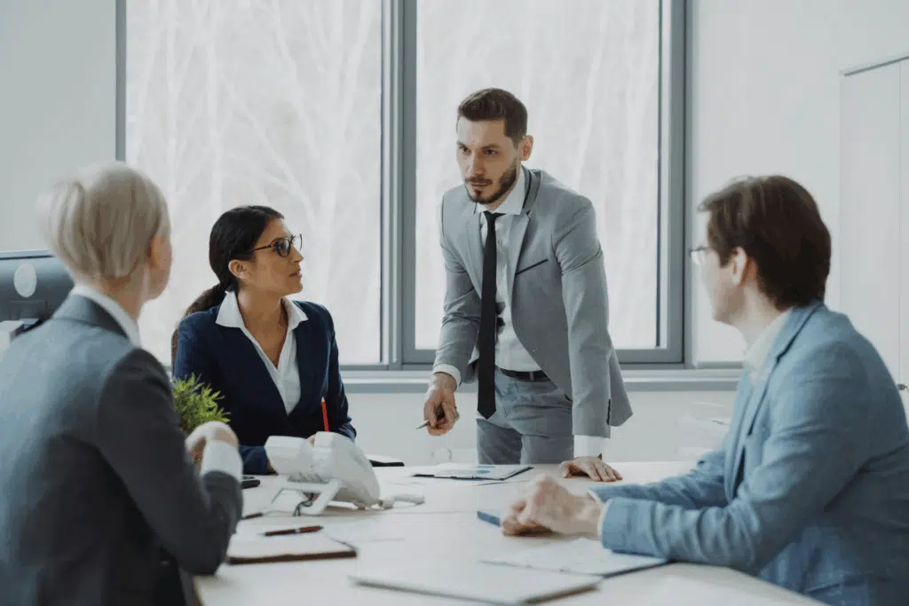 ERP implementation team discussing why some ERP implementations fail to deliver value