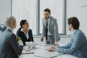 ERP implementation team discussing why some ERP implementations fail to deliver value